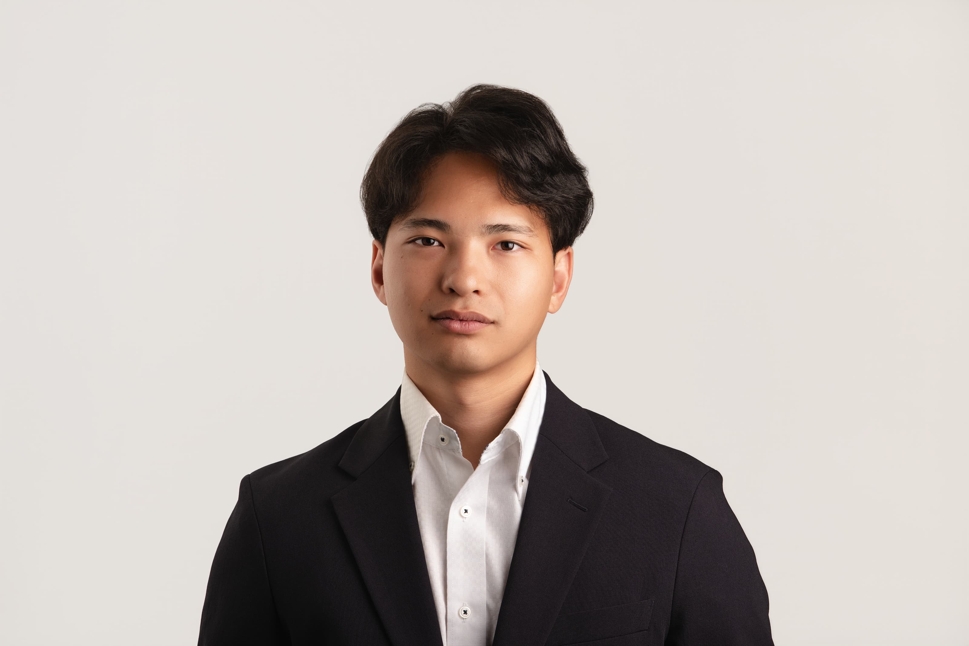 堤 真聖